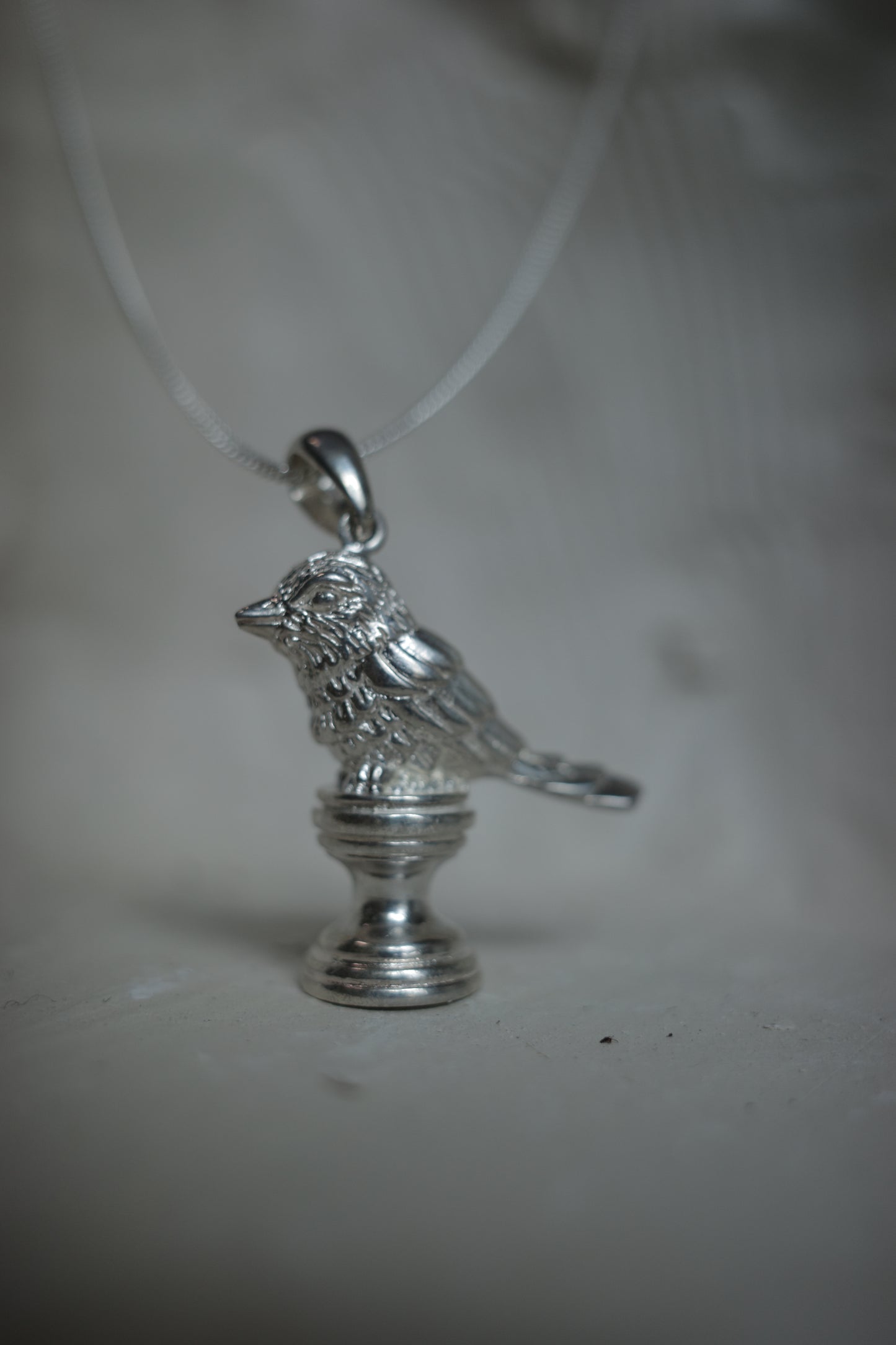 Bird On A Pedestal Pendant Set