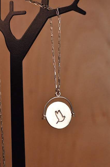 Sterling Silver Spinning Bird Pendant