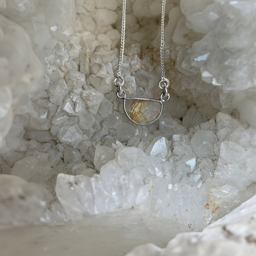 Half moon Rutilated Quartz pendant