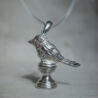 Bird On A Pedestal Pendant Set